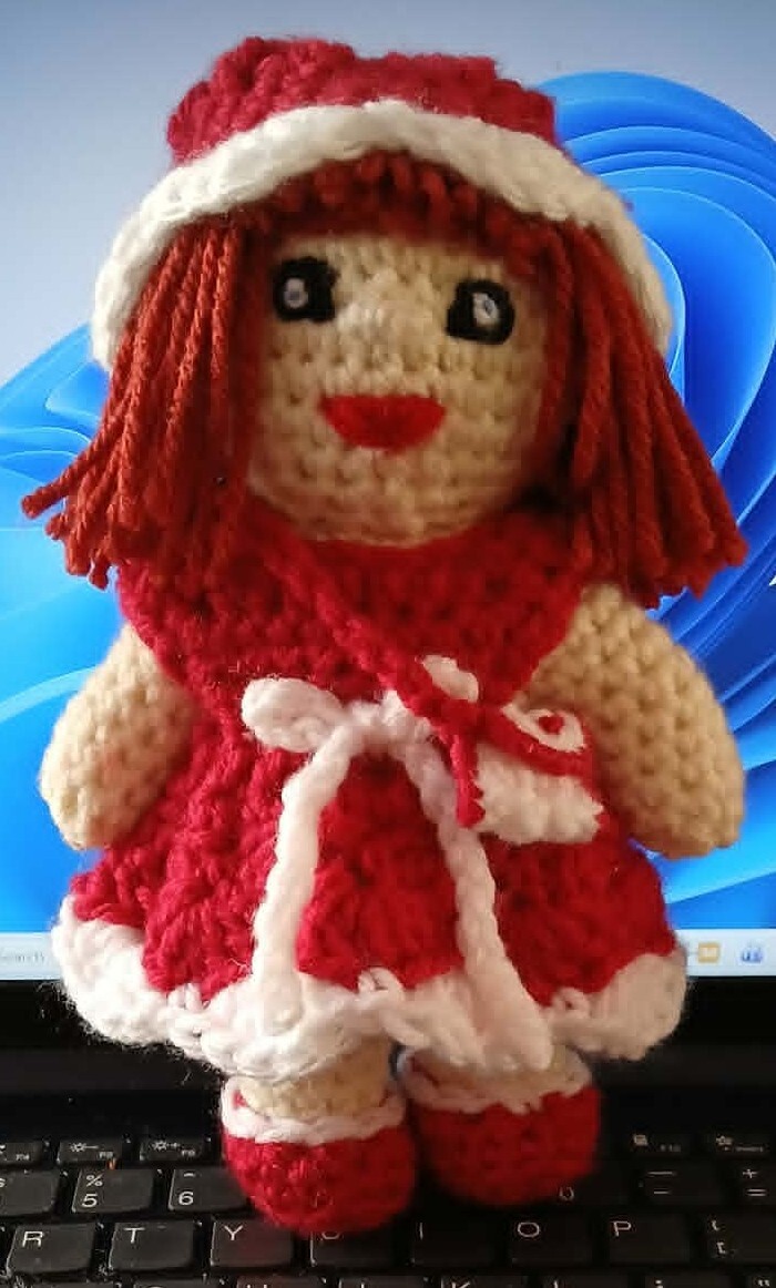 My crochet doll with 3 crochet outfts