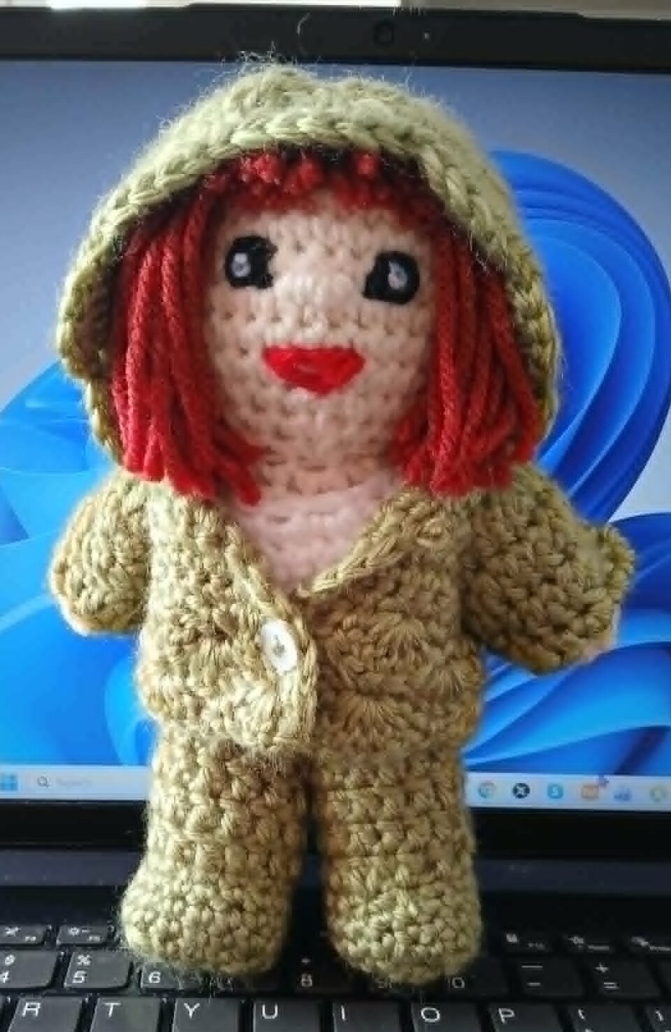 My crochet doll with 3 crochet outfts