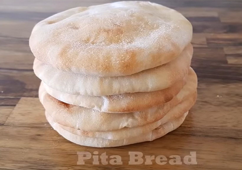 Pita Bread                                                                                                                                             (makes 10 )Ingredients:3½ cups (490g) all-purpose flour1½ tbsp active-dry yeast1+1/3 cups (320ml) warm water2 tbsp olive oil1 tbsp sugar1 tsp saltDirections:1. In a small bowl mix yeast, sugar and 1/3 cup of warm water. Let sit 5-10 minutes.2. In a large mixing bowl mix flour with salt. Add olive oil, yeast mixture and water. Mix until a dough is formed. Knead the dough about 6-7 minutes. until the dough is smooth and elastic. If the dough to sticky add more flour, if the dough to dry add a little bit of water.3. Place the dough in an oiled bowl, cover with towel or plastic wrap and let it rise until doubled in size. About 1 hour.4. Turn dough onto a lightly floured surface, gently push the air out and divide into 10 equal pieces about 3oz (85g) each piece. Roll each piece into a smooth ball, cover and let rest 30 minutes. 5. preheat oven to 450F (230C) with the baking tray inside.6. With a rolling pin, roll each ball into about 6-inch (15cm) circle. Set aside on a lightly floured countertop. cover with a towel and let pitas rest about 10-15 minutes.7. Bake the pitas for 4-5 minutes. remove from the oven and cover immediately with towel. Keep in closed bag.