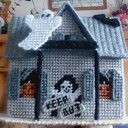 Haunted house, roof lifts up on one side to make it a candy dish.