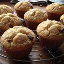 BUTTERTART MUFFINS½ cup melted butter1 cup brown sugar2 large eggs1 tsp vanilla extract1½ cups all-purpose flour2 tsp baking powder¼ tsp salt½ cup milk¾ cup chopped pecans or walnuts (optional)¾ cup raisins (or chocolate chips if you prefer!)For the Topping (optional ):2 tbsp brown sugar1 tbsp melted butterSet to 350°F (175°C).Line a muffin tin with paper liners or grease lightly.In a bowl, whisk together melted butter, brown sugar, eggs, and vanilla until smooth.Stir in flour, baking powder, and salt. Add milk slowly until just combined.Mix in raisins and nuts (or chocolate chips).Spoon batter evenly into muffin cups, about ¾ full.A Brush each top with melted butter and sprinkle brown sugar.Bake 18–20 minutes, until golden and a toothpick comes out clean.Let rest 5 minutes before serving warm