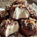 Cool Whip CandyIngredients:- 1 (8 oz) tub Cool Whip, fully thawed (full-fat recommended)- ½ cup powdered sugar- 1 tsp vanilla extract (optional, for flavor depth)- 16 oz high-quality milk or dark chocolate melting wafers (or almond bark)- ¼ cup finely chopped roasted peanuts or almonds- 2 tbsp mini chocolate chips or shaved chocolate (for topping)Directions:1. In a mixing bowl, combine the fully thawed Cool Whip with powdered sugar and vanilla extract. Mix gently until smooth and well combined.2. Line a baking sheet with parchment paper. Using a spoon or small cookie scoop, drop small dollops of the Cool Whip mixture onto the parchment, shaping into bite-sized candies. Freeze for at least 1 hour or until firm.3. Melt the chocolate wafers in a microwave-safe bowl in 30-second intervals, stirring between each until fully melted and smooth.4. Remove the frozen Cool Whip bites from the freezer. Using a fork or dipping tool, dip each bite into the melted chocolate, ensuring it is fully coated. Shake off excess chocolate and place back on the parchment-lined sheet.5. Immediately sprinkle the finely chopped nuts and mini chocolate chips or shaved chocolate on top of each candy before the chocolate sets.6. Refrigerate the candies for 30 minutes or until the chocolate coating hardens completely.7. Store in an airtight container in the refrigerator until ready to serve.Prep Time: 15 minutes | Cooking Time: 10 minutes | Total Time: 1 hour 55 minutesKcal: Approximately 90 kcal per bite | Servings: 20-24 candiesTips:For a richer flavor, use dark chocolate wafers and roasted almonds instead of peanuts.  Ensure the Cool Whip bites are completely frozen before dipping to prevent melting and easier coating.