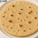 Roti / ChapatiIngredients• 3 cups whole wheat flour• ¼ cup water• ½ tsp saltInstructions1. Make the dough:Mix flour and salt, then slowly add water until a soft dough forms.2. Knead:Knead for 8–10 minutes until smooth and elastic. Let it rest for 15–20 minutes.3. Shape:Divide into small balls and roll each into a thin circle.4. Cook:Heat a skillet. Place one roti on it and cook until bubbles appear, then flip.5. Finish:Press lightly with a cloth or spatula so it puffs up. Remove and brush lightly with ghee (optional).
