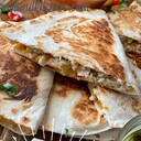 CHICKEN QUESADILLASASSY SAUCE1 cup real mayonnaise1 teaspoon Taco SeasoningQUESADILLASBurrito size Flour TortillasCooked, roasted, or grilled chicken, chopped smallSharp Cheddar CheeseOPTIONAL INGREDIENTSChopped bell peppersRed OnionChopped CilantroPRESENTATIONHot salsaGuacamoleLETS MAKE IT!Preheat griddle or skillet to medium high heat.In a small bowl, combine the mayonnaise and taco seasoning. Spread a layer of sassy sauce on the whole tortilla. On one half of the tortilla add ingredients in this order:ChickenCheeseBell PeppersOnionCilantroFold the other half of the tortilla over the ingredients and light press down to meld the ingredients together. Using a spatula, transfer to the griddle or skillet. Let cook for 3-4 minutes, or until browned and crispy. Flip, and cook another 3-4 minutes. Transfer to a cutting board and cut into triangles. Serve with guacamole and hot salsa.