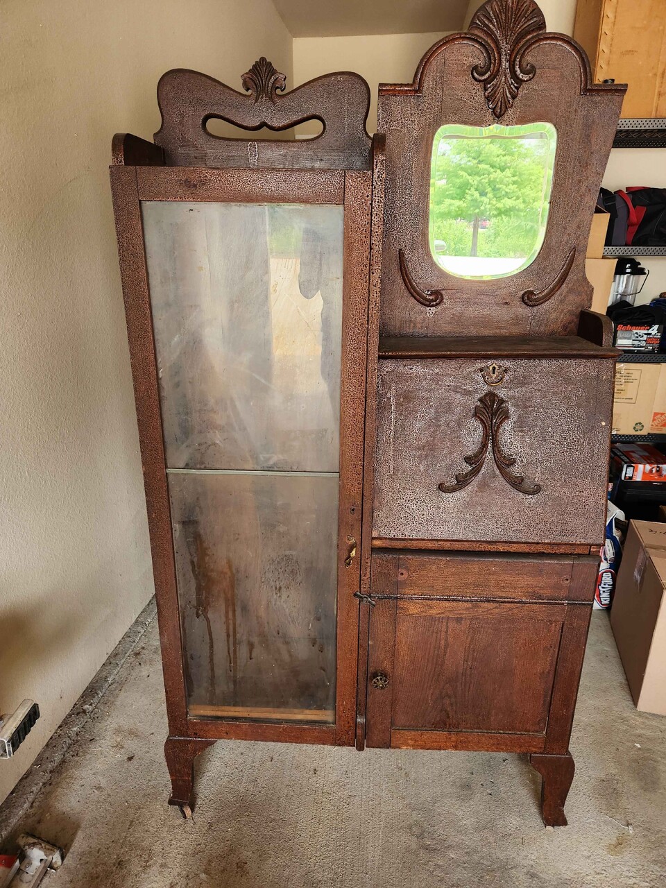 I'm looking for information on an antique secretary desk with a hutch. We cannot find any production markings on it, which suggests that it may have been handmade. Additionally, it has not been refinished. A friend of mine recommended against refinishing it, as it might decrease its value. Any information regarding its origins and potential worth would be greatly appreciated.I posted more information and pictures in an article under Antiques.